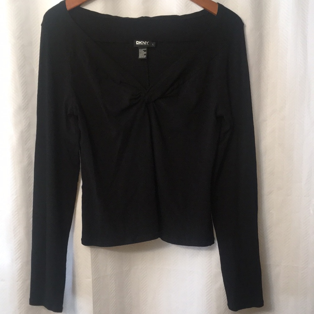DKNY slightly off shoulder form fitting top.